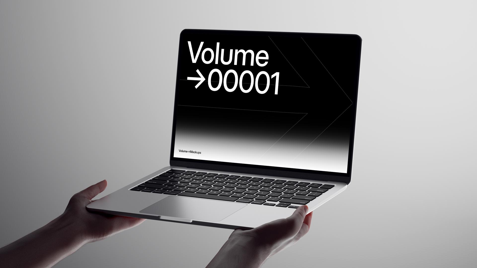 MacBook Mockups in Hands scene 1